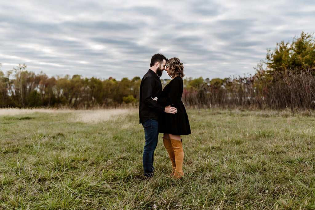 Kyle & Kat embrace in field